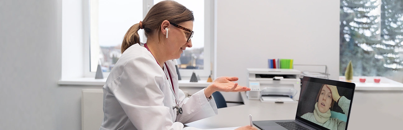 Laptop, smartphone, webcam and stable internet setup required for a telehealth GP appointment
